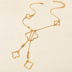 Gold clover charm lariat necklace with dangling chains and open clover pendants