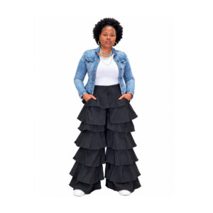Black tiered ruffle wide leg pants modeled with white top and denim jacket